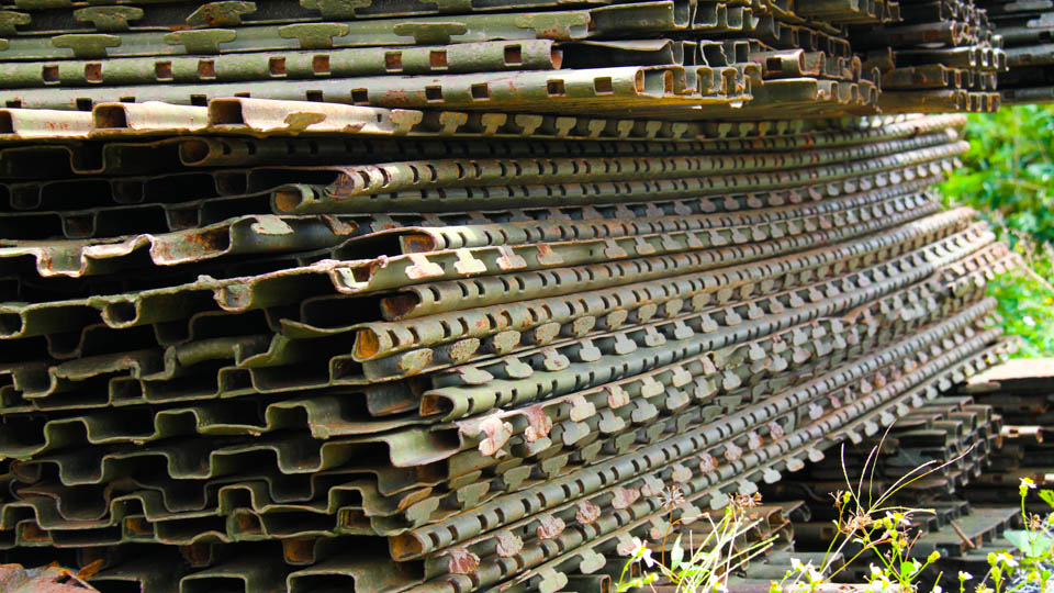 These metal panels made makeshift airstrips during the war. In 1993 they were used for houses, fences, bridges and more.